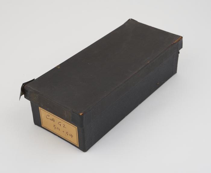 Black slide box, labelled Cats G2, G13