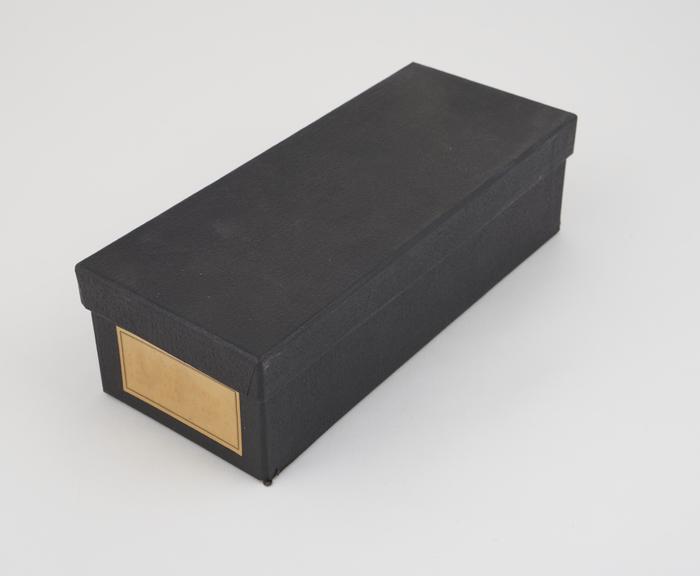 Black slide box, labelled (faded) Cat G59, G60, G61, G62, G63