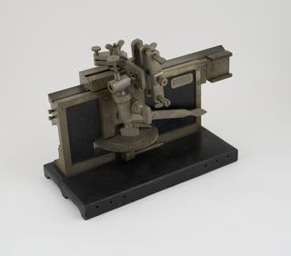 Sliding microtome no.1849, with 4 knives in cases,