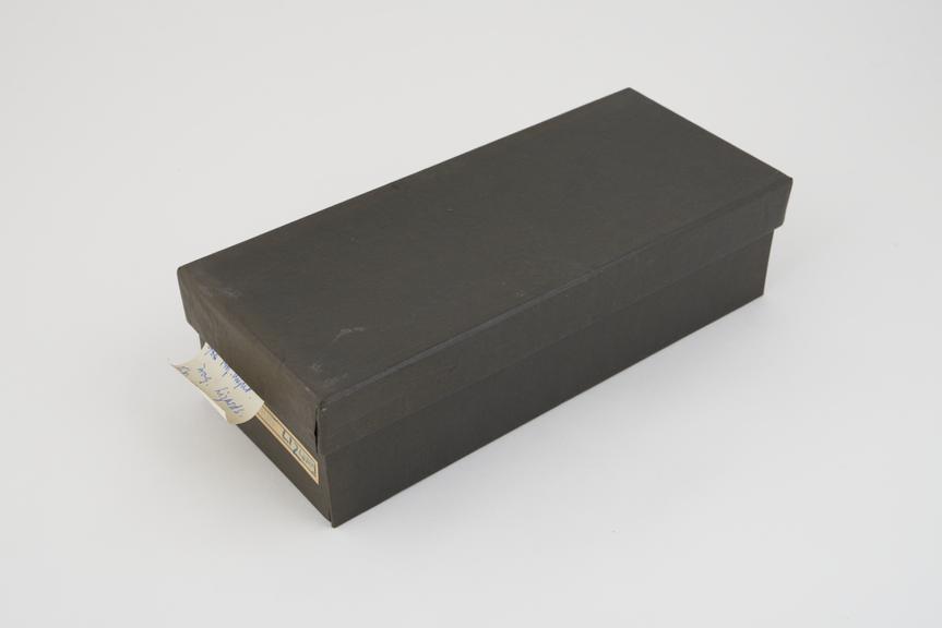 Collection of histological slide sections in black box