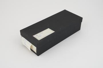 Collection of histological slide sections in black box