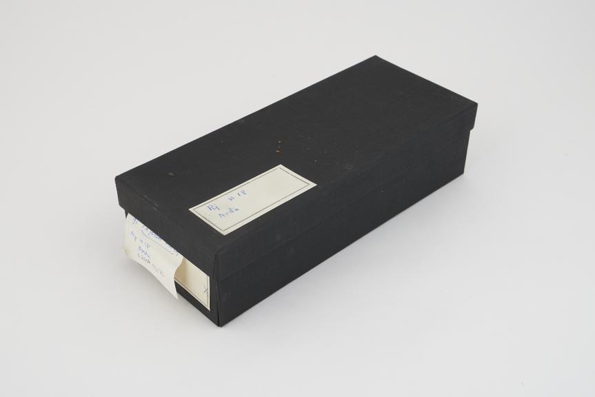 Collection of histological slide sections in black box