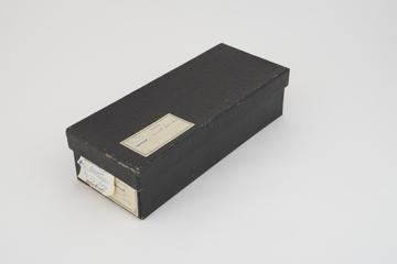 Collection of histological slide sections in black box