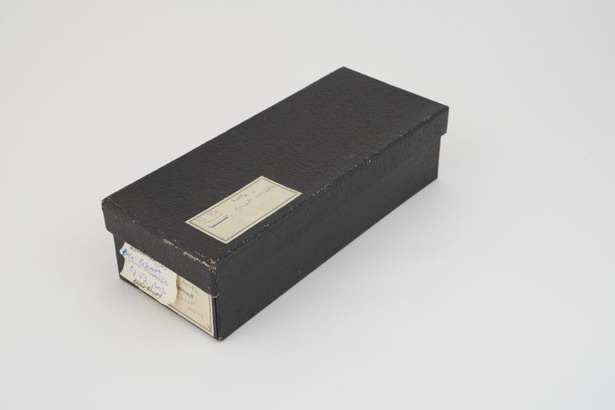 Collection of histological slide sections in black box