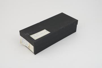 Collection of histological slide sections in black box