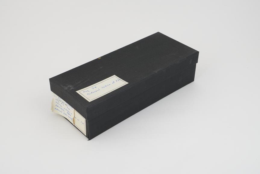 Collection of histological slide sections in black box
