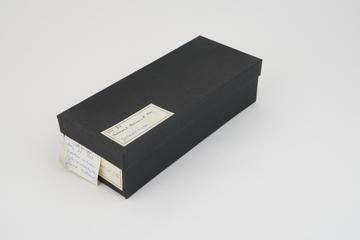 Collection of histological slide sections in black box