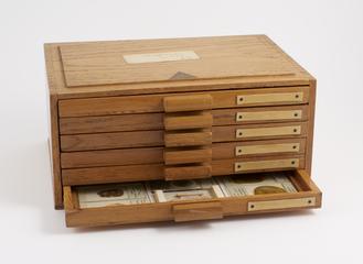 Wooden slide box containing 6 trays with slides of various specimens