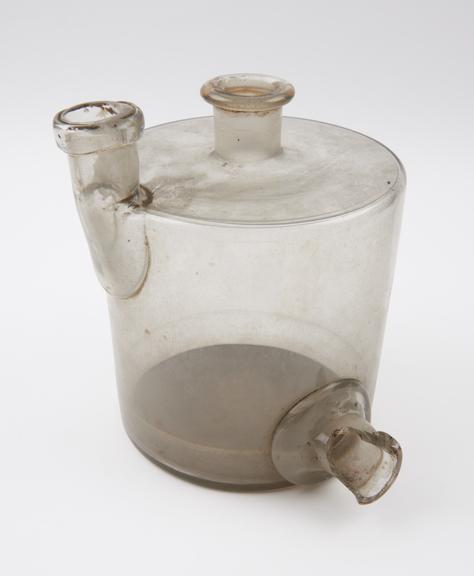 Clear glass Woulfe bottle, cylindrical, with three tubulure's