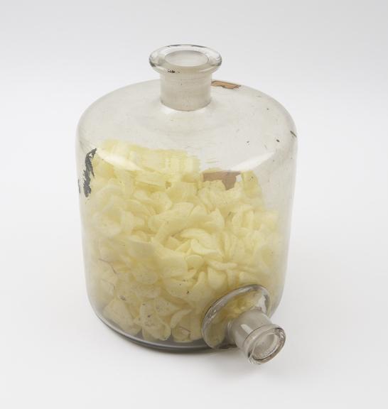 Large clear glass jar, cylindrical, with neck and outlet