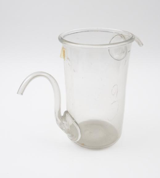 Large clear glass displacement jar in cylindrical form with