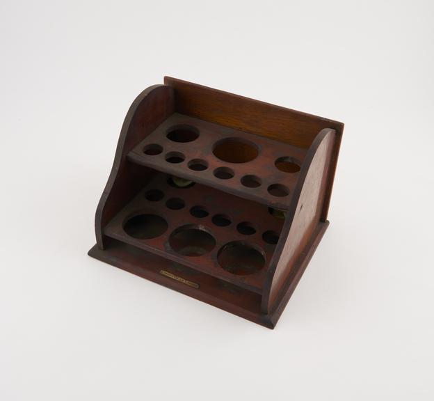 Test tube rack, mahogany, by Lynch and Co., London, 1880-1930