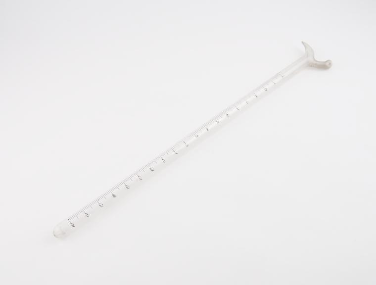 Clear glass burette, calibrated in grains