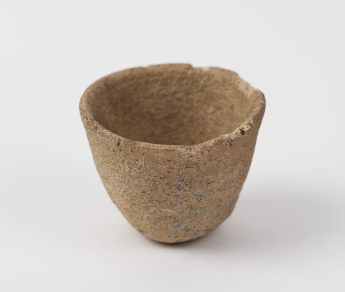 Small circular earthenware crucible