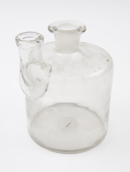 Clear glass woulfe bottle, cylindrical body, with two tubulures