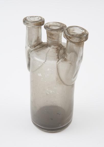 Clear glass Woulfe bottle with neck and two tubulures