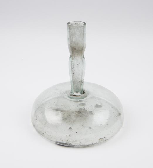 Squat bulbous glass flask, flat base, cylindrical neck