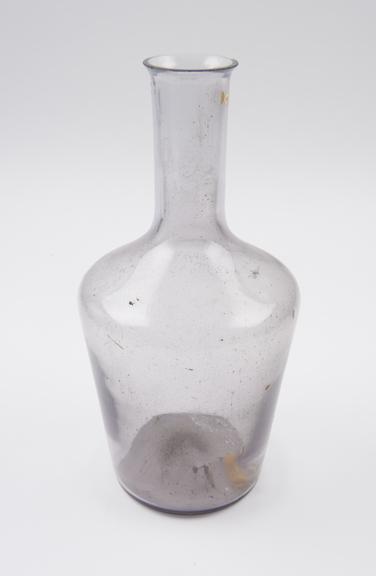 Glass flask, slightly smoky, with kick up in base