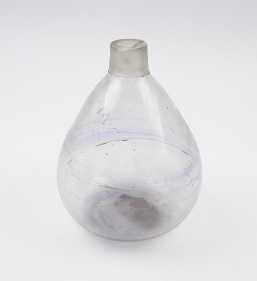 Clear glass flask, pear shaped, with ground glass neck