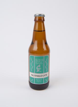 Bottle of beer made from genetically modified yeast, England, 1995