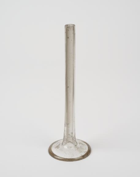 Glass tube, rim widely flared at one end, measuring cylinder(?)