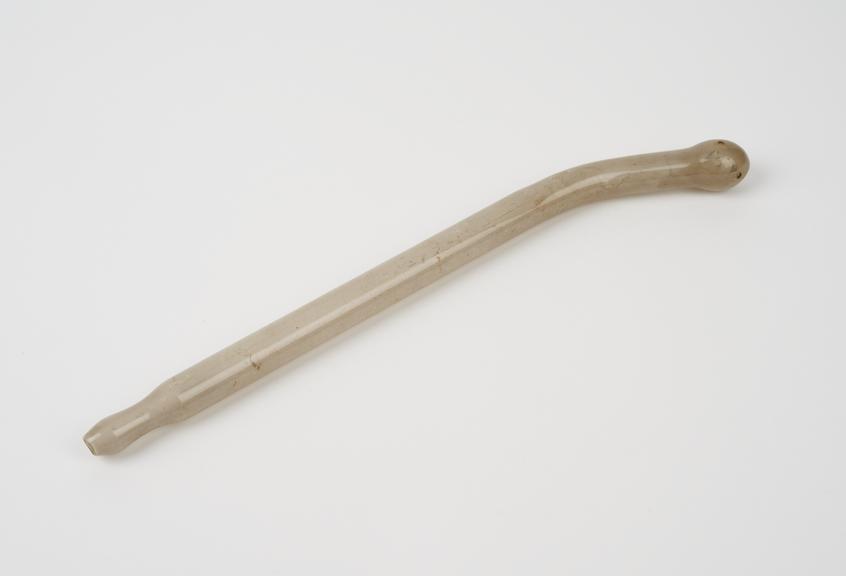 Opaque glass tube slightly curved one end with bulbous