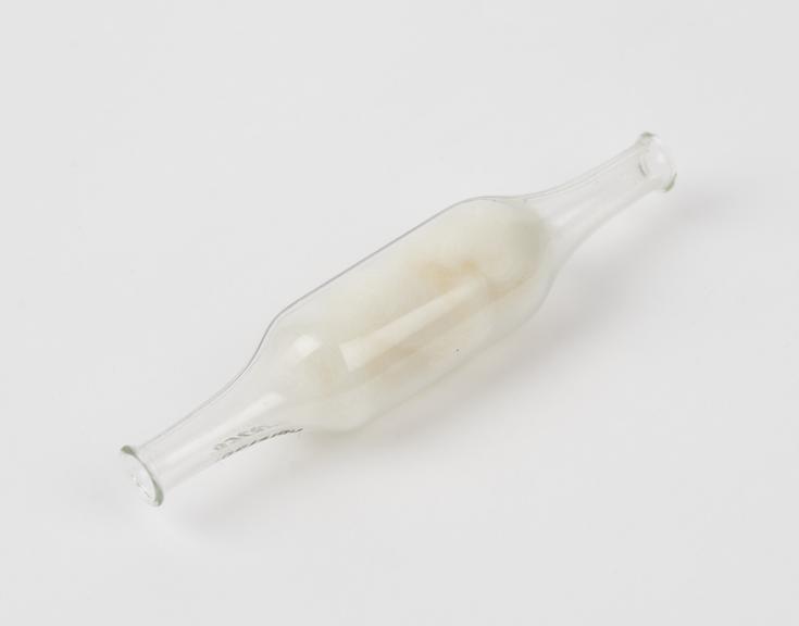 Tube, glass, with cotton wool wad
