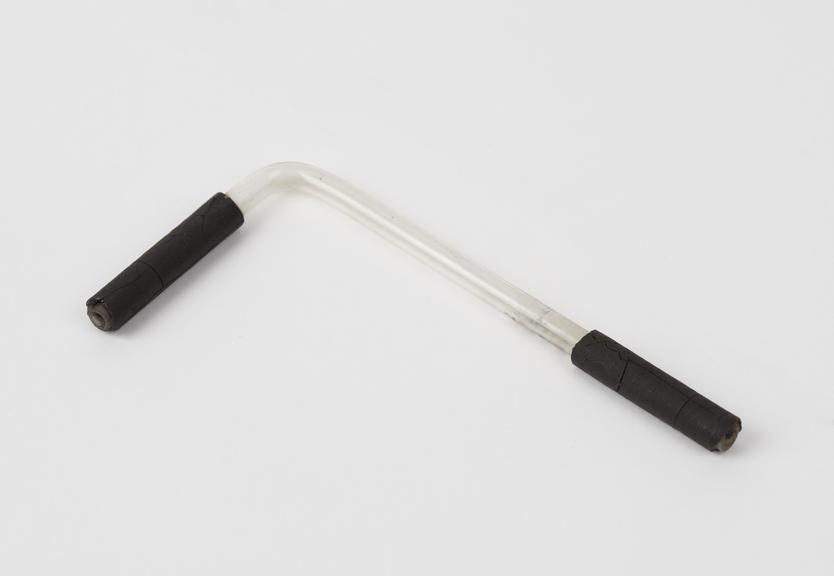 Tube, glass, right angle bend, rubber sleeves at both ends