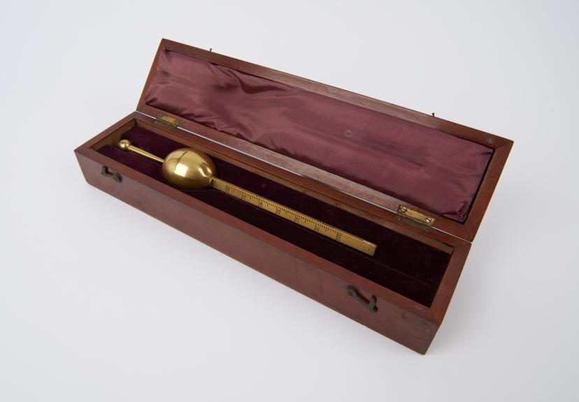 Brass hydrometer in mahogany case, by Thomas O