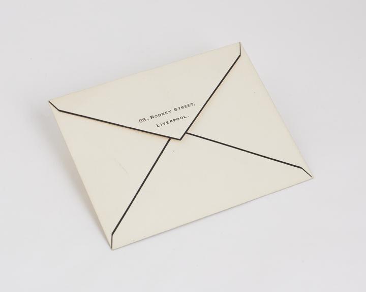 Black-edged envelope, with address of sender on flap