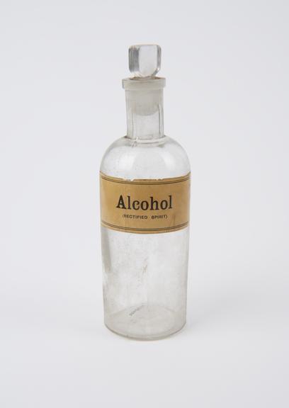 Bottle, shop round, clear glass, for alcohol, European