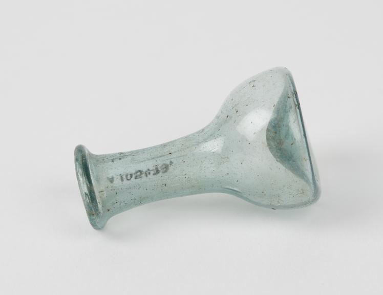 Glass flask, pale blue, conical body, kicked base