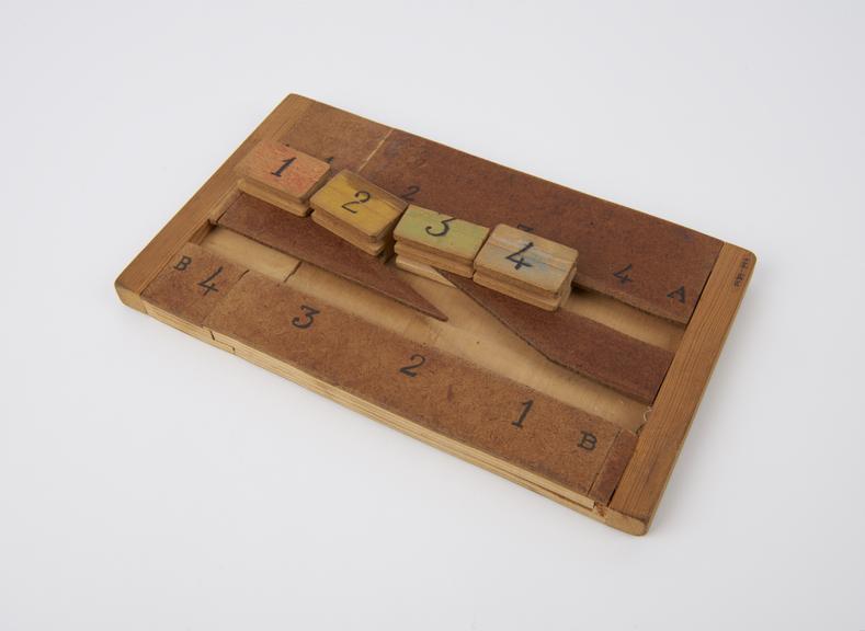 Puzzle, sliding block, one of thirteen puzzles