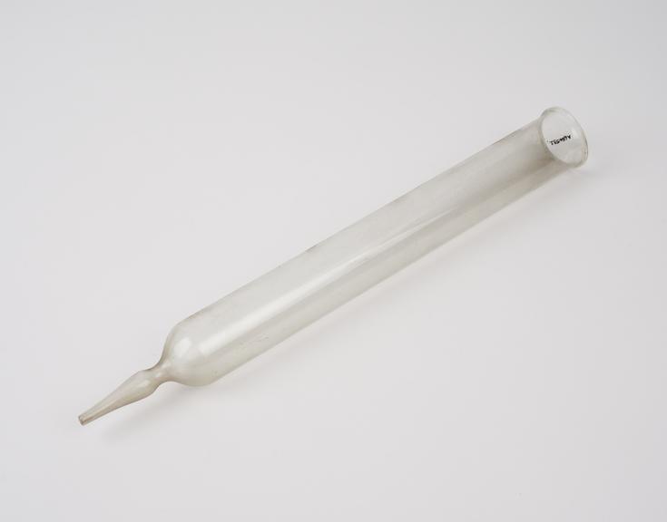 Clear glass funnel, in the form of an elongated cylinder