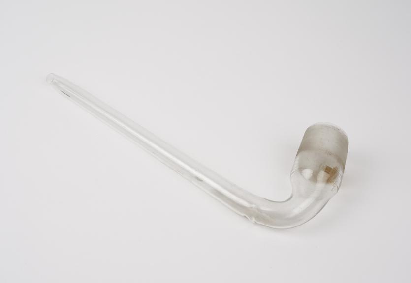 Clear glass funnel, stem rising at acute angle to neck