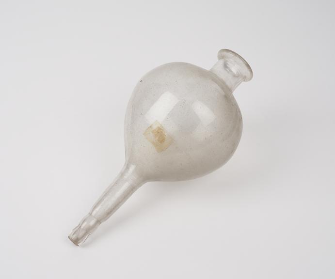 Glass funnel, bulbous body with elongated nozzle below and