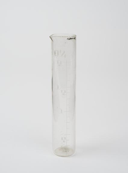 glass measuring cylinder, probably English, 19th century