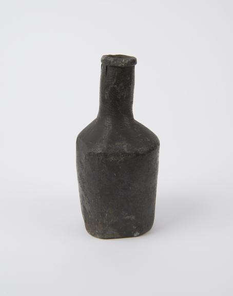 Small lead flask, cylindrical body, square shoulders