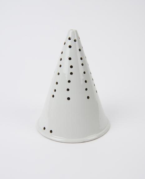 White porcelain filter, glazed, cone shaped, with hole in body