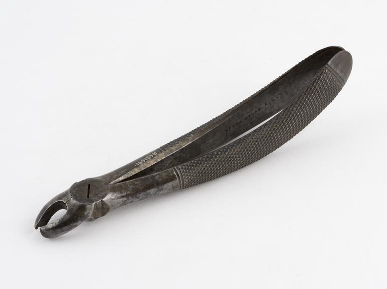 Dental forceps, for right upper molars, steel, by Pearce and Co