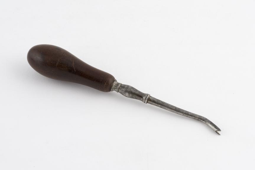 Dental punch elevator, steelwith wood handle, probably English