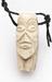 Ivory amulet in the form of a carved face, from Kasai, Zaire