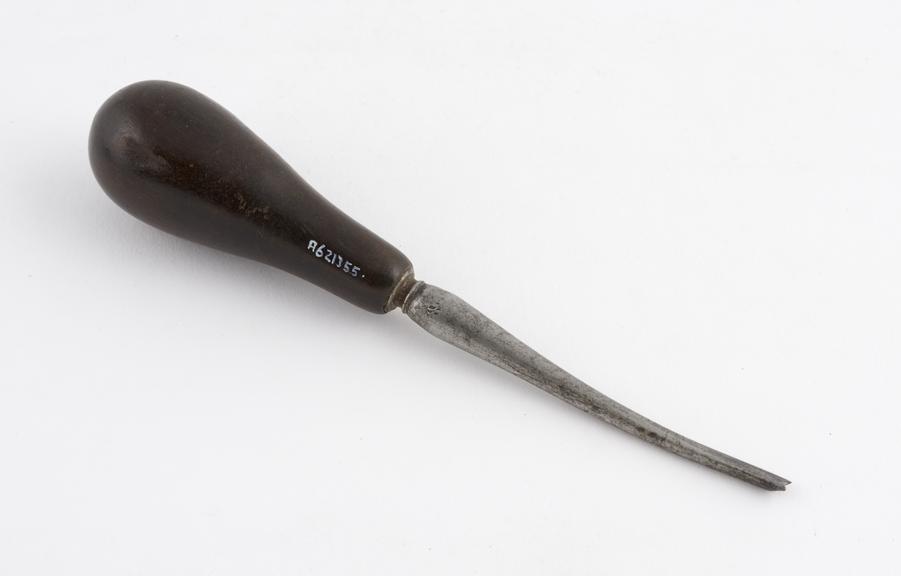 Dental punch elevator, steel with wooden handle