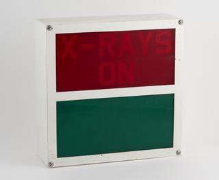 Illuminated sign indicating radiotherapy machine is in use