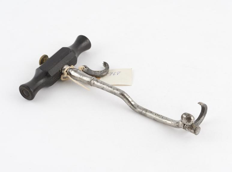 Dental key, double bend, steel with ebony handle, spare claw