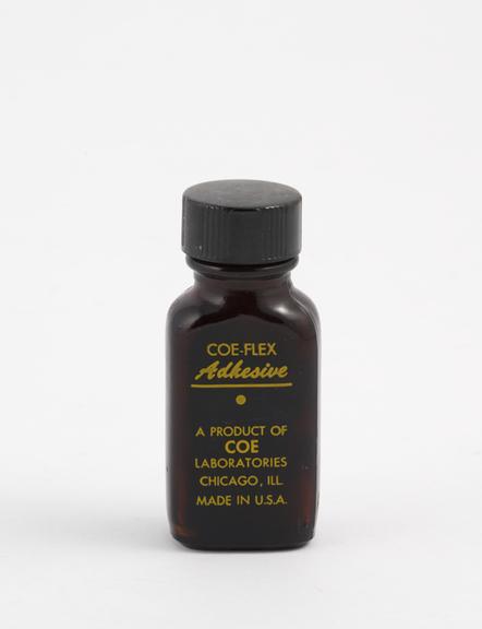 Glass bottle of Coe-Flex adhesive, by Coe Laboratories, USA