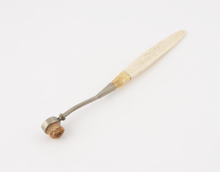 Denture brush, ivory handle, fibrous cane head