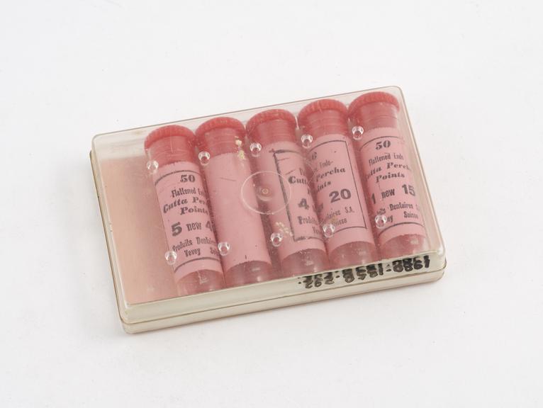 Box containing 5 tubes for gutta percha nerve canal points