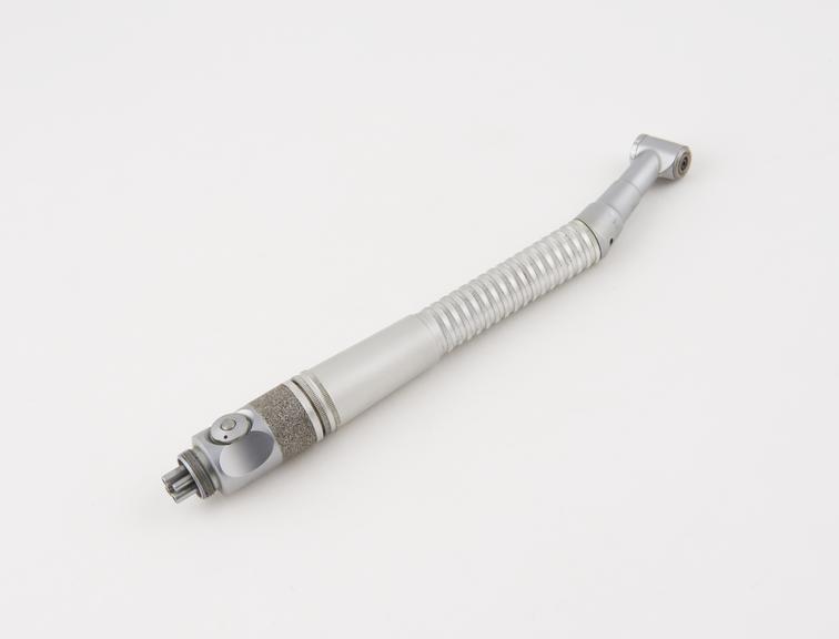 Contra angle turbine handpiece, fitted with 4-3 hole coupling