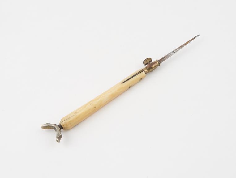 Dental crutch drill, gilt steel with ivory handle